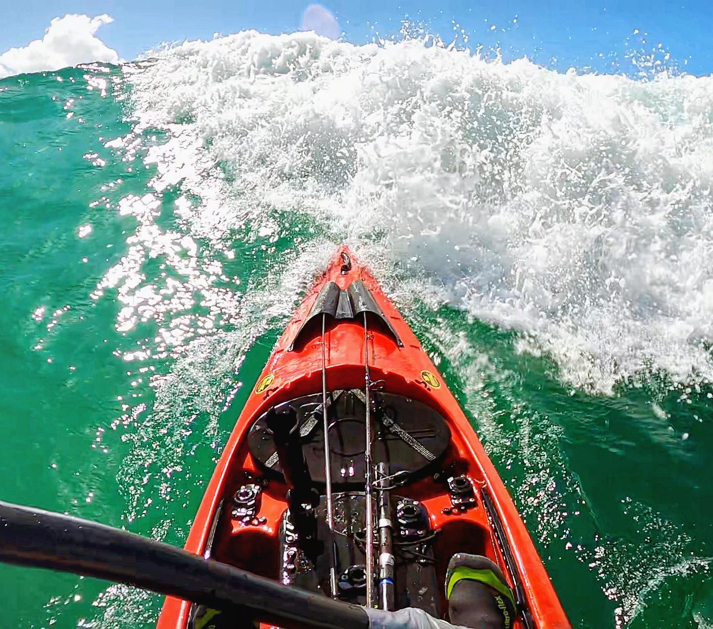 A fully rigged viking profish reload fishing kayak rests on the beach at sunrise, with multiple rods upright and accessories secured. The image captures the calm before launch, with golden sunlight reflecting off the ocean. This photo visually represents the offshore readiness and early morning ritual of dedicated kayak anglers. Featured in the profish reload review by paddle guy on the kayak and sup blog.