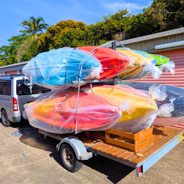 Kayaks loaded on a trailer ready for delivery